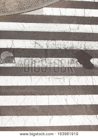 Safety on traffic concept. Urban city pedestrian zebra crossing view from top.