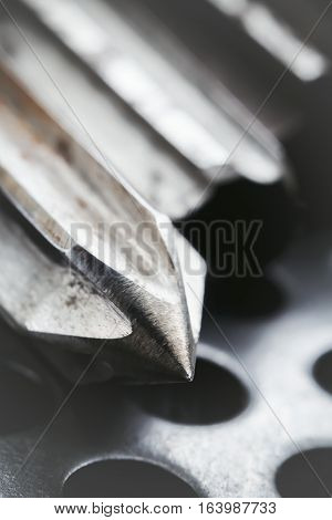 Drill reamer at factory workshop. Selective focus