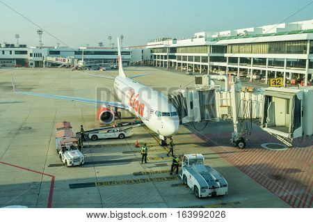 BANGKOK, THAILAND-DEC 29 2016. Thai Lion airline loading cargo on the plane at the gate in Don Mueang international airport (DMK)