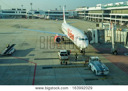 BANGKOK, THAILAND-DEC 29 2016. Thai Lion airline loading cargo on the plane at the gate in Don Mueang international airport (DMK)