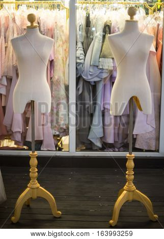 Two White female dressmakers dummies tailor mannequins