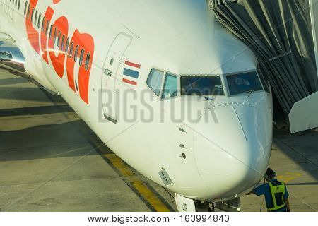BANGKOK, THAILAND-DEC 29 2016. Thai Lion airline loading cargo on the plane at the gate in Don Mueang international airport (DMK)
