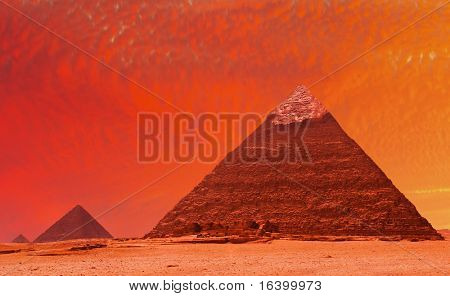 Starověké egyptské pyramidy v rudý západ slunce