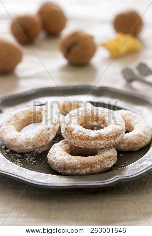Sand Dough Biscuits, Coffee And Walnuts On A Linen Tablecloth. Rustic Style.