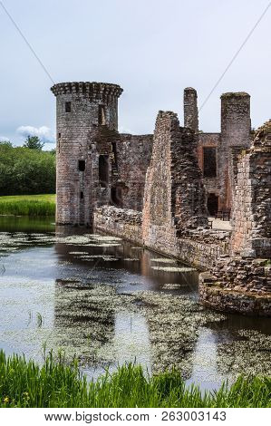 Shearington, Scotland, Uk - June 18, 2012: Closeup Of South Side Of Ruined  Triangular Brown Stone M
