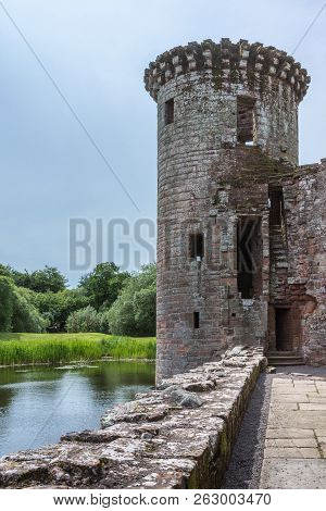 Shearington, Scotland, Uk - June 18, 2012: Closeup Of Southwest Tower Of Ruined  Triangular Brown St