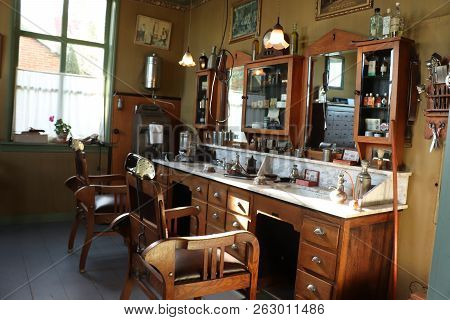 Enkhuizen, The Netherlands - October 12th 2018: Vintage Barber Shop, Reconstruction In Zuiderzee Ope