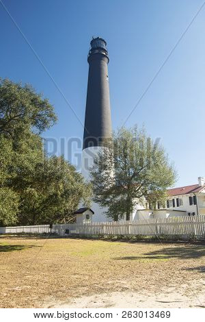 Pensacola Lighthousein Front Of Blue Sky In Pensacola Florida