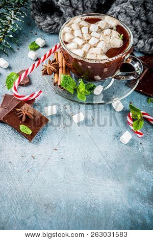 Homemade Hot Chocolate With Mint, Candy Cane And Marshmallow, Light Blue Background With Warm Blanke