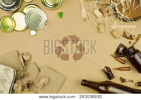 Garbage Trash: Wooden Fork Spoon And Corks, Metal Aluminium Cans And Bottle Caps, Brown Glass Of Bot
