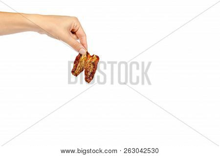 Sun Dried Red Tomatoes With Hand Isolated On White Background, Copy Space Template