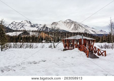 Peak And Hotel Patria In Strbske Pleso, High Tatras, Slovak Republic. Winter Mountains. Travel Desti