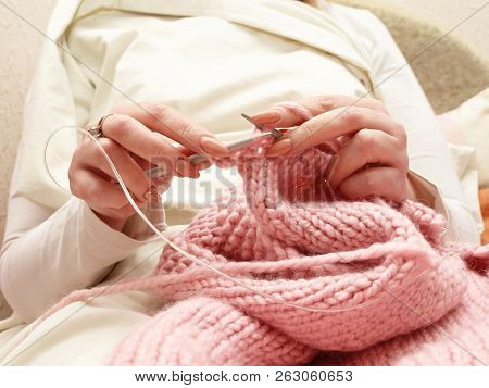 Knitting. Close Up Of Woman Hands Knitting With Knitting Needles.