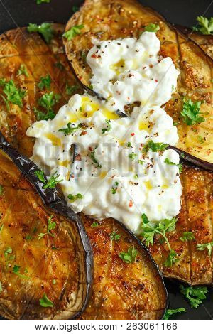 Healthy Vegeterain Oven Baked Aubergines, Eggplant With Cottage Cheese Dip, Parsley And Lemon Wedge.