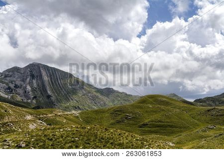 Beautiful Landscape In Montenegro With Fresh Grass And Beautiful Peaks. Durmitor National Park In Mo