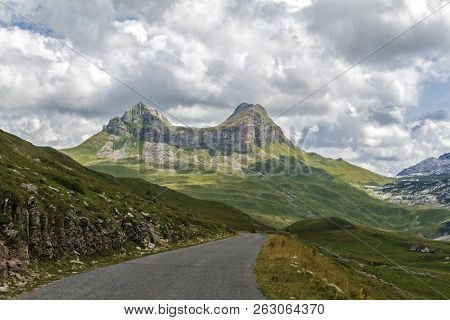 Beautiful Landscape In Montenegro With Fresh Grass And Beautiful Peaks. Durmitor National Park In Mo