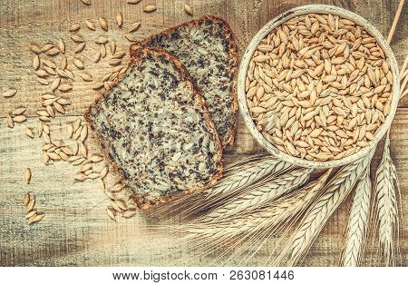 Multi-grain Bread On A Wooden Background. Healthy Food Concept.
