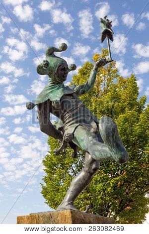 STRATFORD-UPON-AVON, ENGLAND - August 6, 2018: The Jester, a sculpture by James Butler RA, depicting the Fool in Shakespeare's plays, particularly Touchstone, in As You Like It