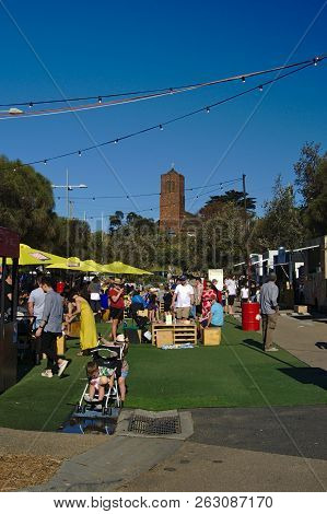 Frankston, Vic / Australia - Oct 13 2018: People At Festival During Daytime On Sunny Day With Plain 