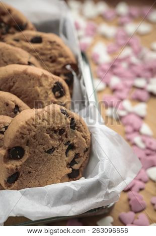 Chocolate Chip Cookies On A Little Box Decotated With Sugar Hearts. Valentine Concept.