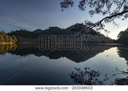 Beautiful Nature Landscape By The Lakeside Will Full Reflection In The Morning.ranu Kumbolo Lake, Se