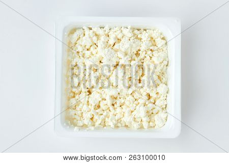 Cottage Cheese In Plastic Container. Grainy Low Fat Cottage Cheese In Plastic Box. Dairy Product Ful