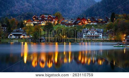 Dramatic And Picturesque Scene At Evening Lake Grundelsee. Mirror Reflection. . Location: Resort Gru