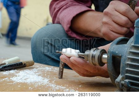 Craftsman Is Shaping Meerschaum. He Is Making Rosary Grains.