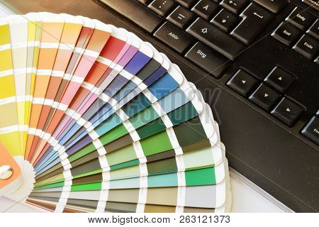 Ral Color Fan Cmyk On Black Keyboard