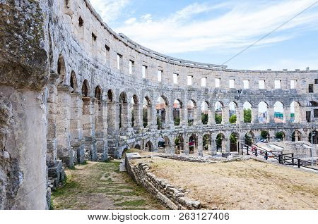 Pula, Croatia - June 18, 2014: Stone Arc Columns Rows In Pula Arena. The Most Famous And Important M