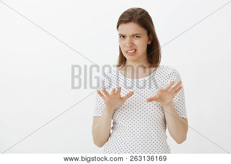 No, Take It Away From Me. Disgusted Intense And Displeased Woman In T-shirt, Shaking Palms In Stop O