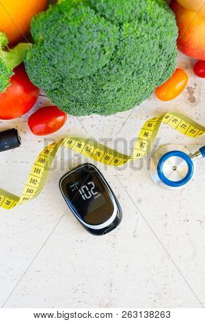 Diabetes Healthy Diet Concept, Raw Vegetables With Blood Glucose Meter
