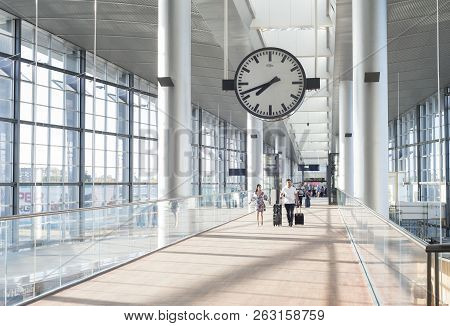 Copenhagen ,denmark - June 13, 2018: Couple At Kastrup Airport Hall In Copenhagen. Kastrup Is The Ma