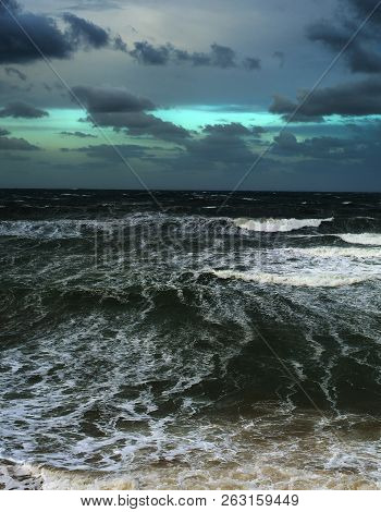 Stromy Ocean With Heavy Clouds In The Day. Portugal