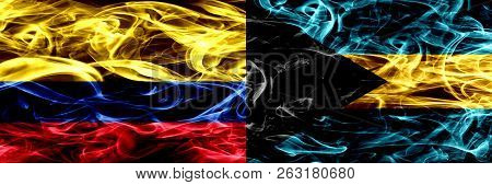 Colombia Vs Bahamas, Bahamian Smoke Flags Placed Side By Side. Thick Colored Silky Smoke Flags Of Co