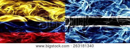 Colombia Vs Botswana, Botswanan Smoke Flags Placed Side By Side. Thick Colored Silky Smoke Flags Of 