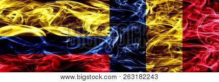 Colombia Vs Chad, Chadian Smoke Flags Placed Side By Side. Thick Colored Silky Smoke Flags Of Colomb