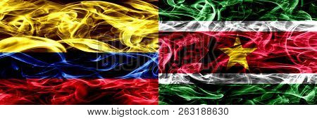 Colombia Vs Suriname, Surinamese Smoke Flags Placed Side By Side. Thick Colored Silky Smoke Flags Of