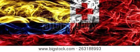 Colombia Vs Tonga, Tongan Smoke Flags Placed Side By Side. Thick Colored Silky Smoke Flags Of Colomb