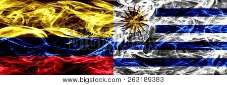 Colombia Vs Uruguay, Uruguayan Smoke Flags Placed Side By Side. Thick Colored Silky Smoke Flags Of C