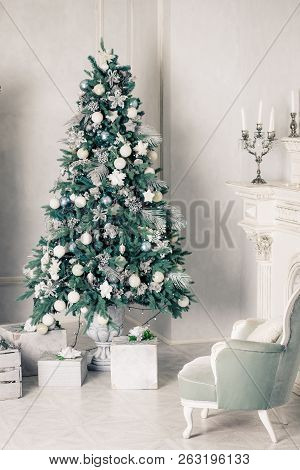 Luxury Living Room Interior With Sofa Decorated Chic Christmas Tree, Gifts, Plaid And Pillows.happy 