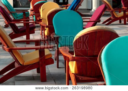 Shot Of An Empty Colorful Chairs Outdoors. Rest, Holidays, Vacation Concept.