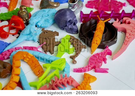 Models Printed By 3d Printer. Bright Colorful Objects Printed On A 3d Printer