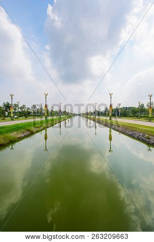 Nakhonpathom , Thailand - 5 Oct, 2018: Beautiful Utthayan Road With Canal In Center