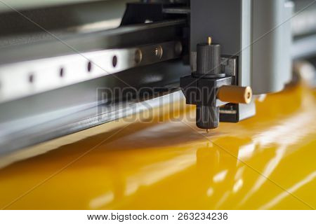 Cutting Plotter Close-up. The Process Of Cutting A Vinyl Film.