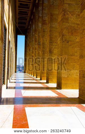 The Narrow Passage With The Pattern Columns Making Shadows Aroun