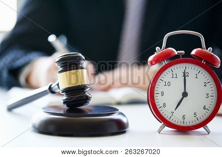 Red Alarm Slock And Judge Hammer Lies On Table In Debate Room For Fair Judgments Economic Notions Of