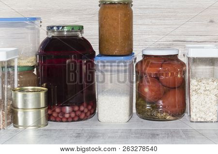 Storage Shelves In Pantry With Homemade Canned Preserved Fruits And Vegetables