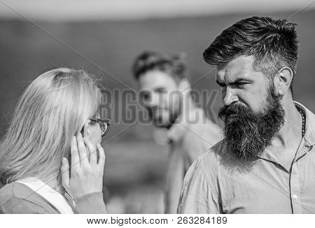 Husband Strictly Watching His Wife Looking At Another Guy While Walk. Jealous Concept. Passerby Smil