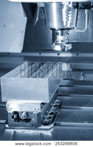 The  Cnc Milling Machine Cutting The Mold Part With The Face-mill Tool.the Hi-technology Manufacturi